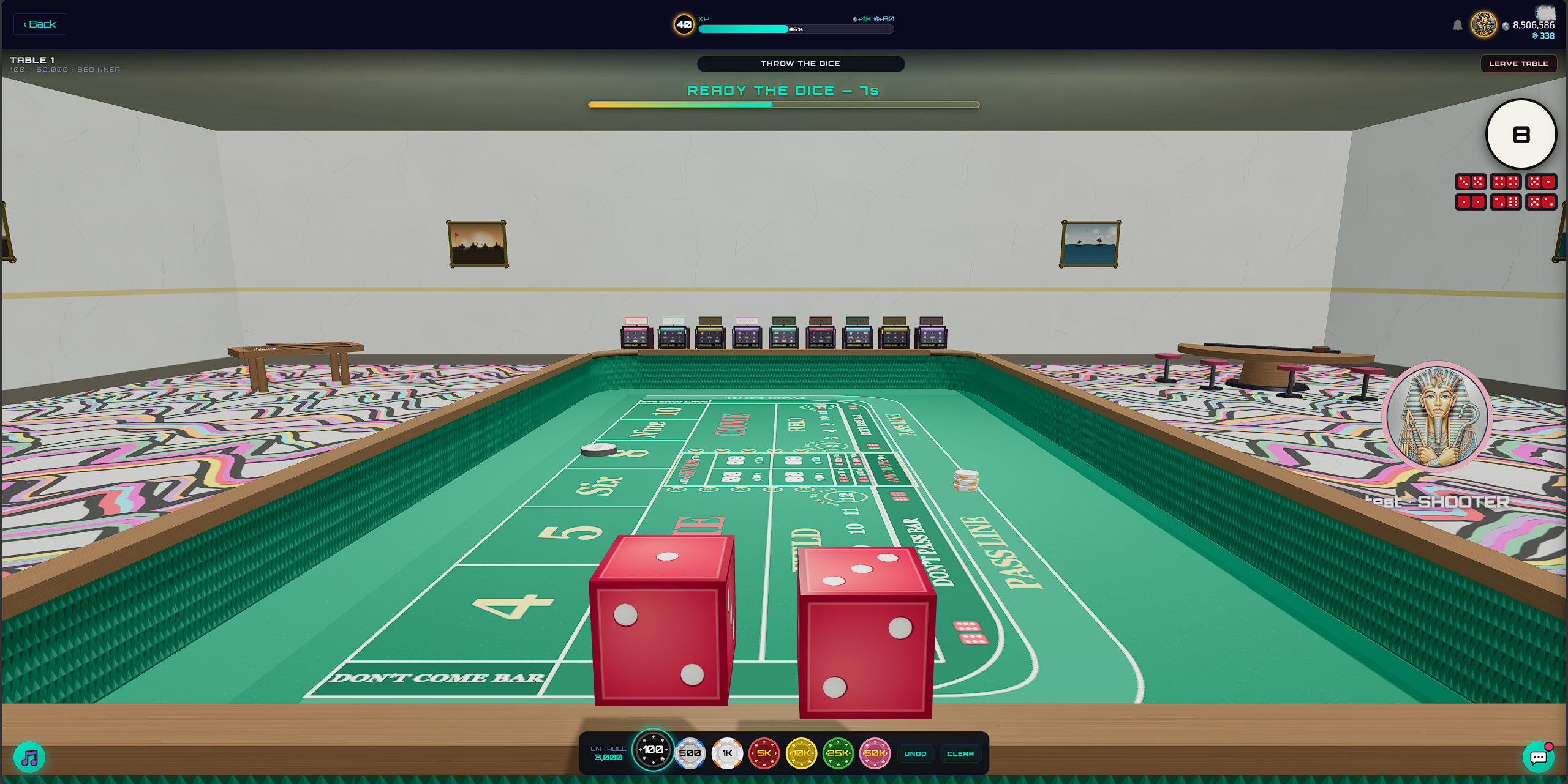 A close up view of dice and a craps table.